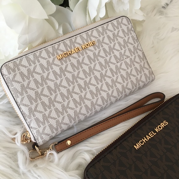 Michael Kors Handbags - Last1✨Michael Kors jet set Large flat phone wallet